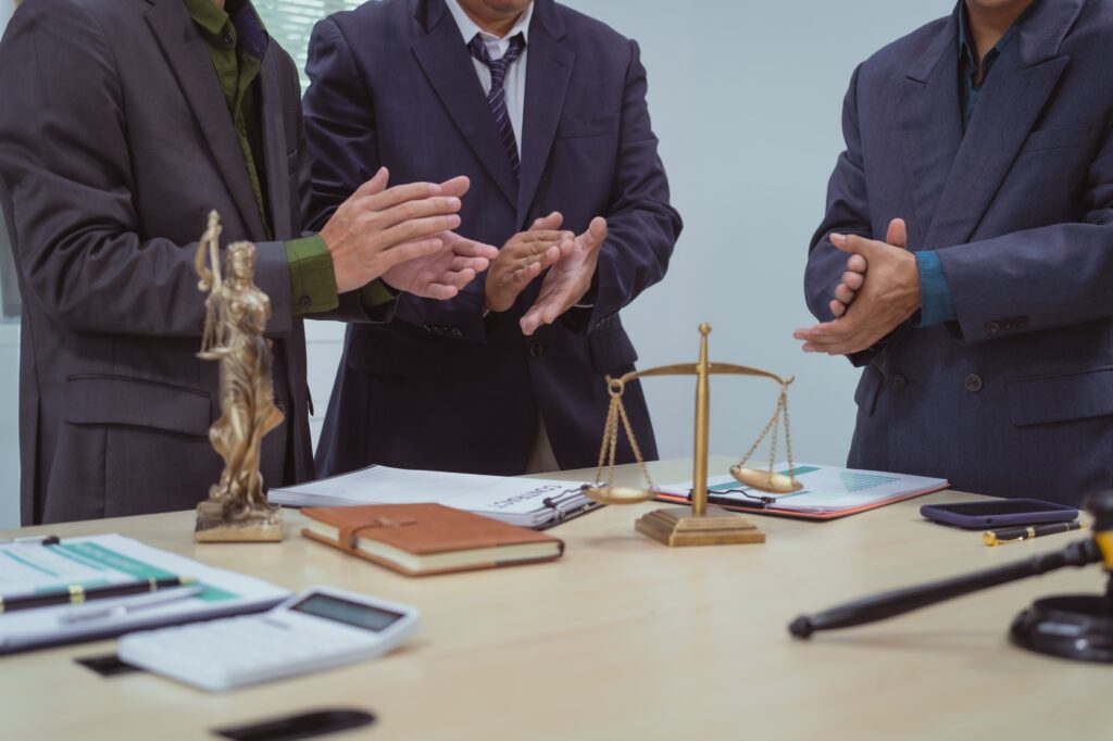 Three lawyers in meeting at the table office, discussing business,civil commercial law,labor law